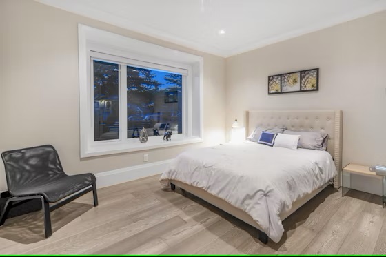 Bedroom with laminate flooring